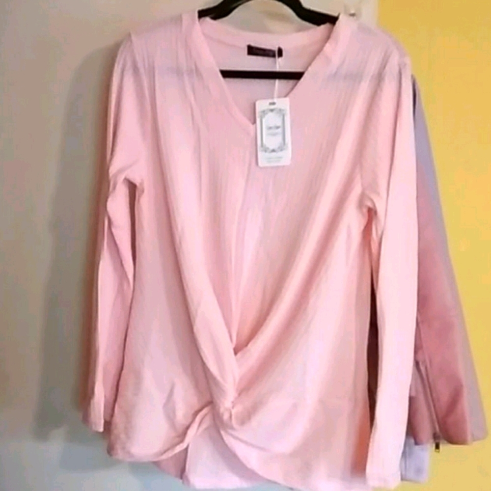 Pink long sleeve shirt with twist front